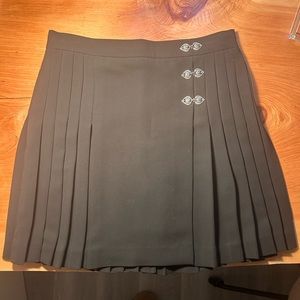 The Kooples black pleated mini skirt with metal embellishment